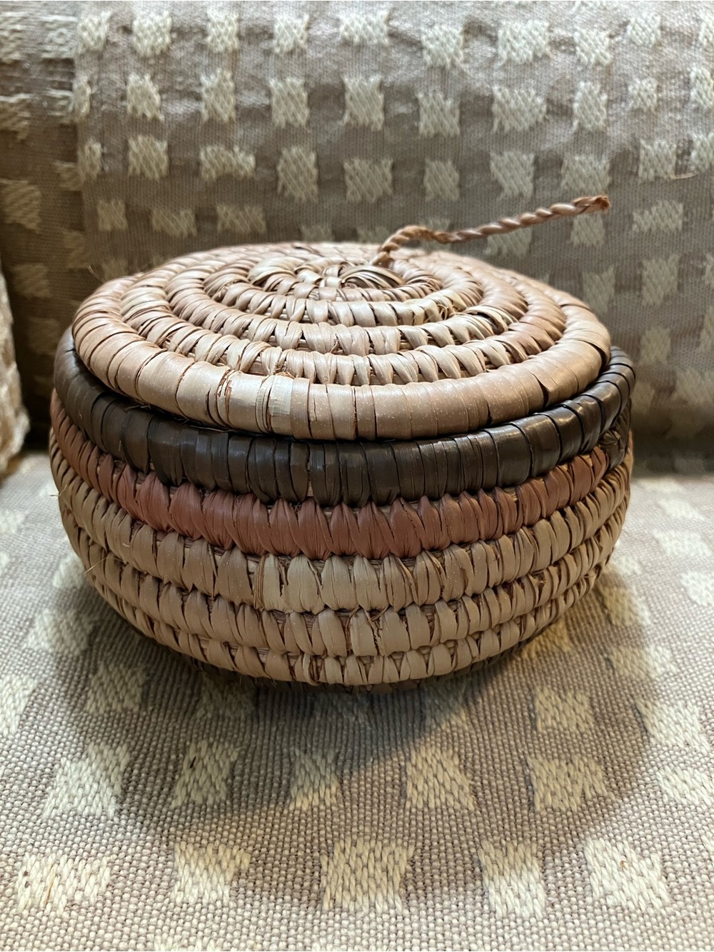 Vintage Mexican hand-woven coiled basket folk art. With lid